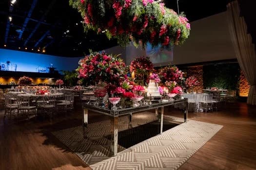 Elegant wedding reception with floral centerpieces and ambient lighting